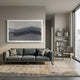 Tessera Silver Mist & Pastel Blue Line Acrylic 3D Wall Art by Giant Sculptures mounted above a grey sofa in a modern living room with bookshelf and armchair.