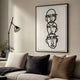 Linea Trio Faces Minimal Acrylic UV 3D Wall Art by Giant Sculptures, three stacked black line-drawn faces in a slim frame above a beige sofa and floor lamp.
