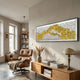 Waveform Yellow Drift Acrylic 3D Wall Art by Giant Sculptures mounted above a wooden console in a modern living room with a leather lounge chair and bookshelf.