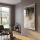 Contour Olive Fade Vertical Ripple Pattern Felt 3D Wall Art in acrylic frame, mounted in a modern living room with armchair, record player, and window.