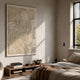 Petalwave Beige Textured Bloom Leather 3D Wall Art by Giant Sculptures displayed above a wooden bench in a sunlit bedroom with neutral bedding and a window.