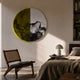 Halvra Citrus Veil Gradient Acrylic 3D Wall Art mounted above a wooden cane chair in a bedroom, with translucent yellow and black-and-white halves.