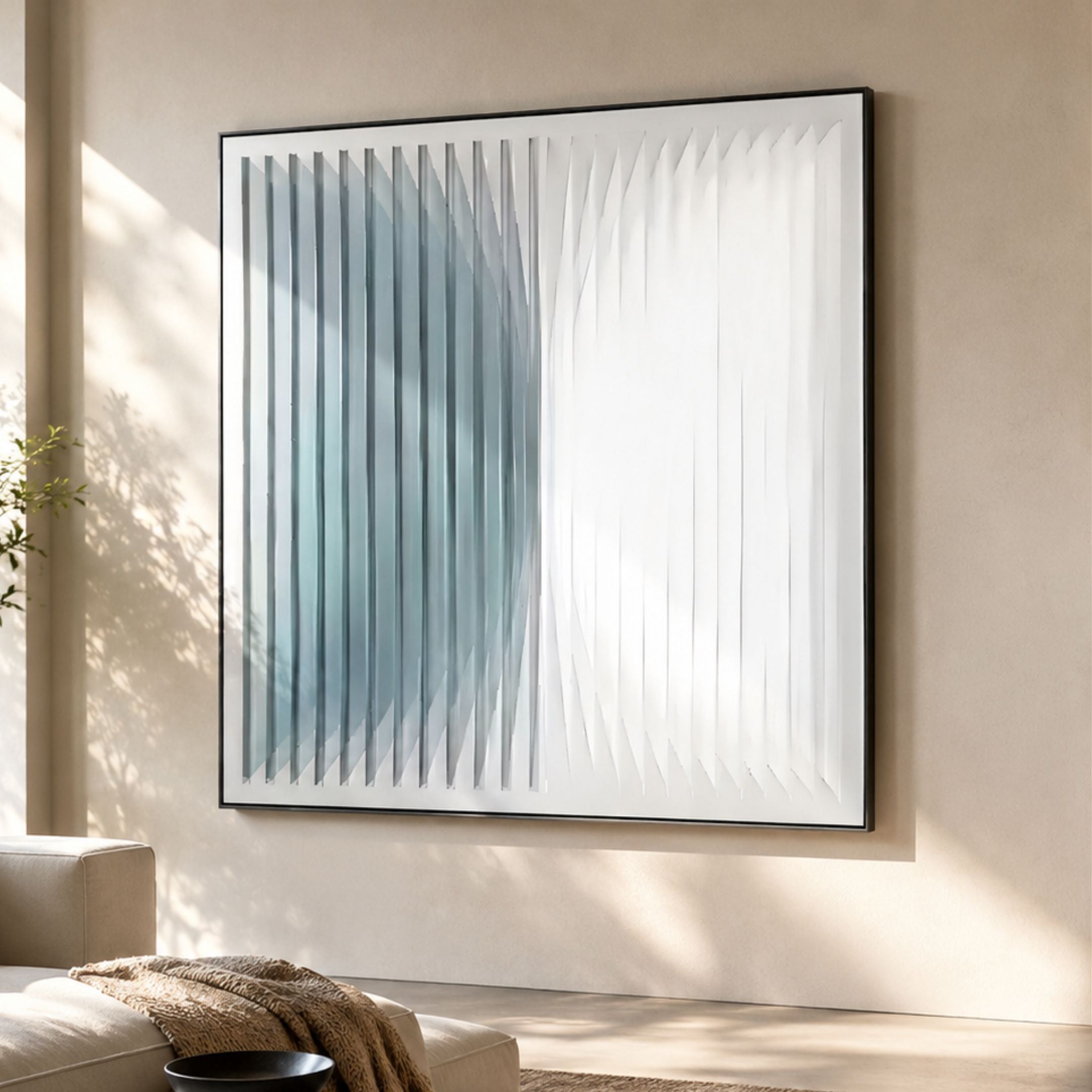 Halcyon Teal Fade Lens Acrylic 3D Wall Art by Giant Sculptures displayed on a beige wall above a cream sofa in a sunlit living room.