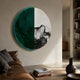 Halvra Emerald Smoke Swirl Acrylic 3D Wall Art mounted above a brown leather sofa, its emerald and black-and-white swirled halves anchoring a sunlit living room.