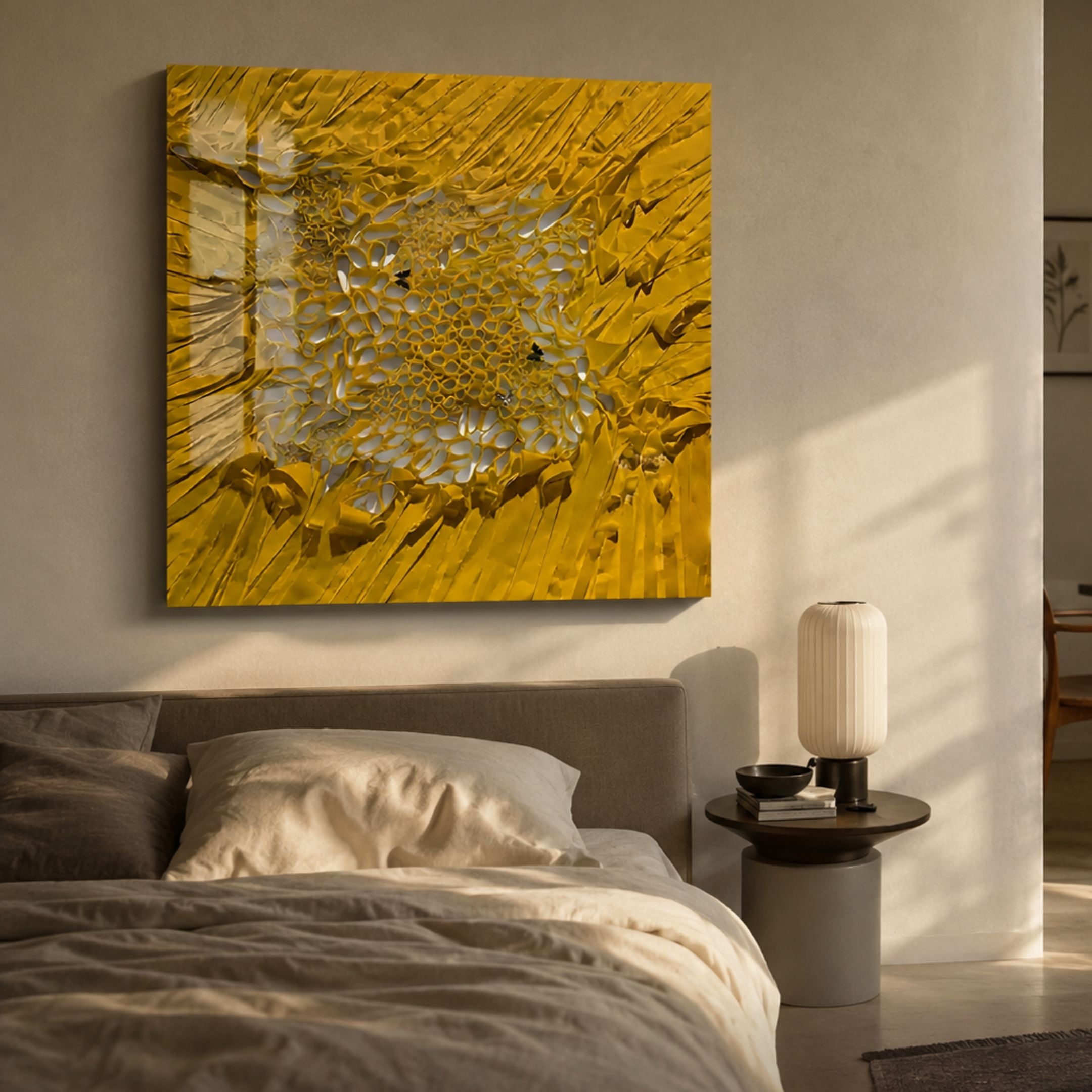 Velorra Golden Honey Bloom Ribbon Acrylic Frame 3D Wall Art displayed above a neutral upholstered bed with a side table and ribbed lamp in a warm bedroom.