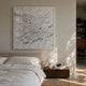 Velorra Pearl White Bloom Ribbon Acrylic Frame 3D Wall Art displayed above an upholstered bed with white linen, walnut nightstand, and mushroom lamp.