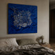 Velorra Royal Blue Bloom Ribbon Frameless 3D Wall Art mounted above a linen bed with olive pillows and a mushroom lamp on a wooden nightstand.