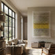 Artisana Yellow & White Grid 3D Paper Wall Art by Giant Sculptures in an acrylic box frame, mounted above a record console in a neutral modern living room.