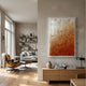 Floravia II White & Amber Ombre Leather 3D Wall Art by Giant Sculptures displayed in a modern living room with an Eames lounge chair and oak sideboard.