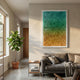 Floravia Teal & Amber Ombre Leather 3D Wall Art by Giant Sculptures displayed in a modern living room above a grey sofa, beside a potted fiddle leaf fig.