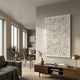 Floravia II White Ruffled Left Leather 3D Wall Art by Giant Sculptures displayed in a neutral living room above a walnut console with brass lamp and books.