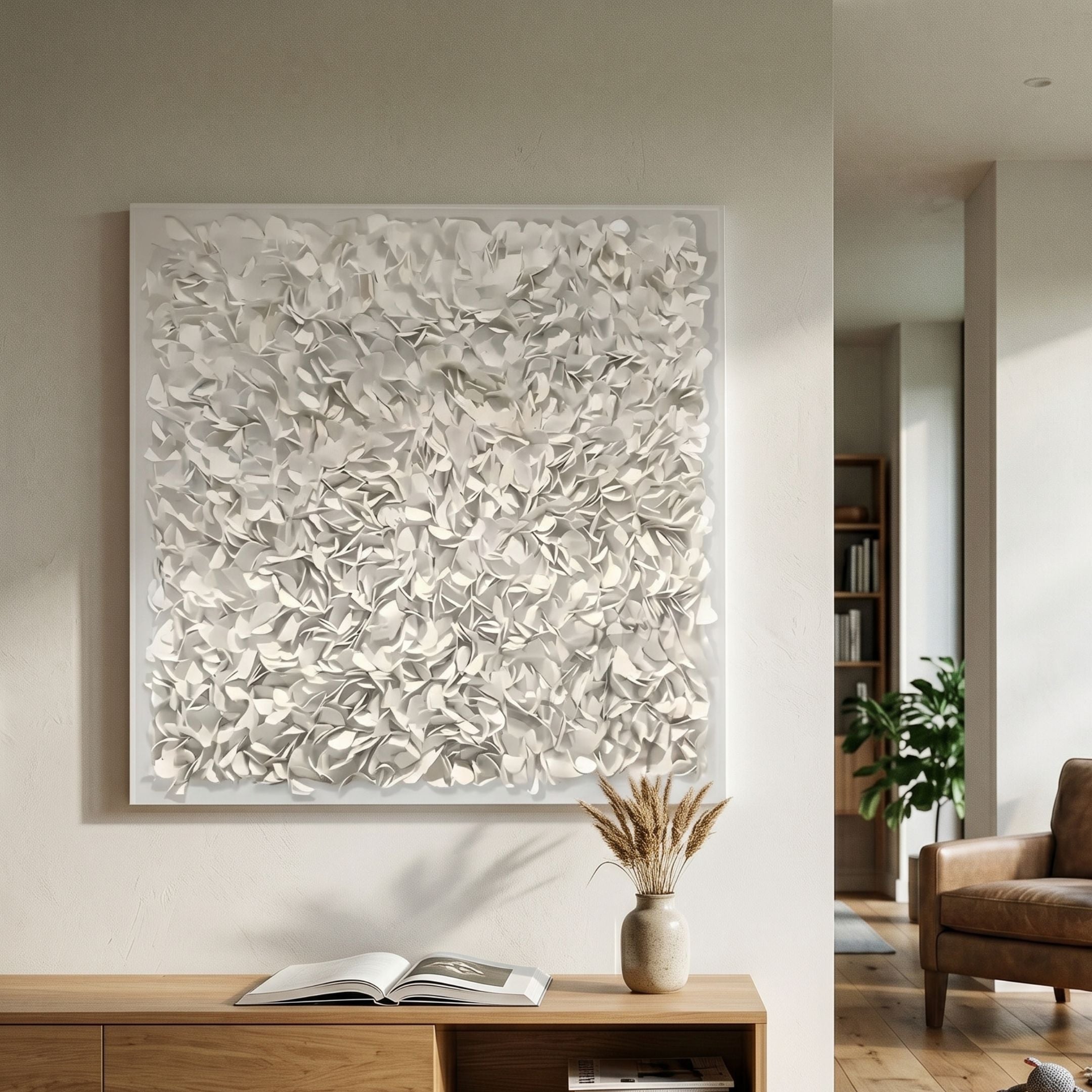 Floravia White Ruffled Pedal Leather 3D Wall Art by Giant Sculptures displayed above an oak sideboard with a dried grass vase in a neutral living room.