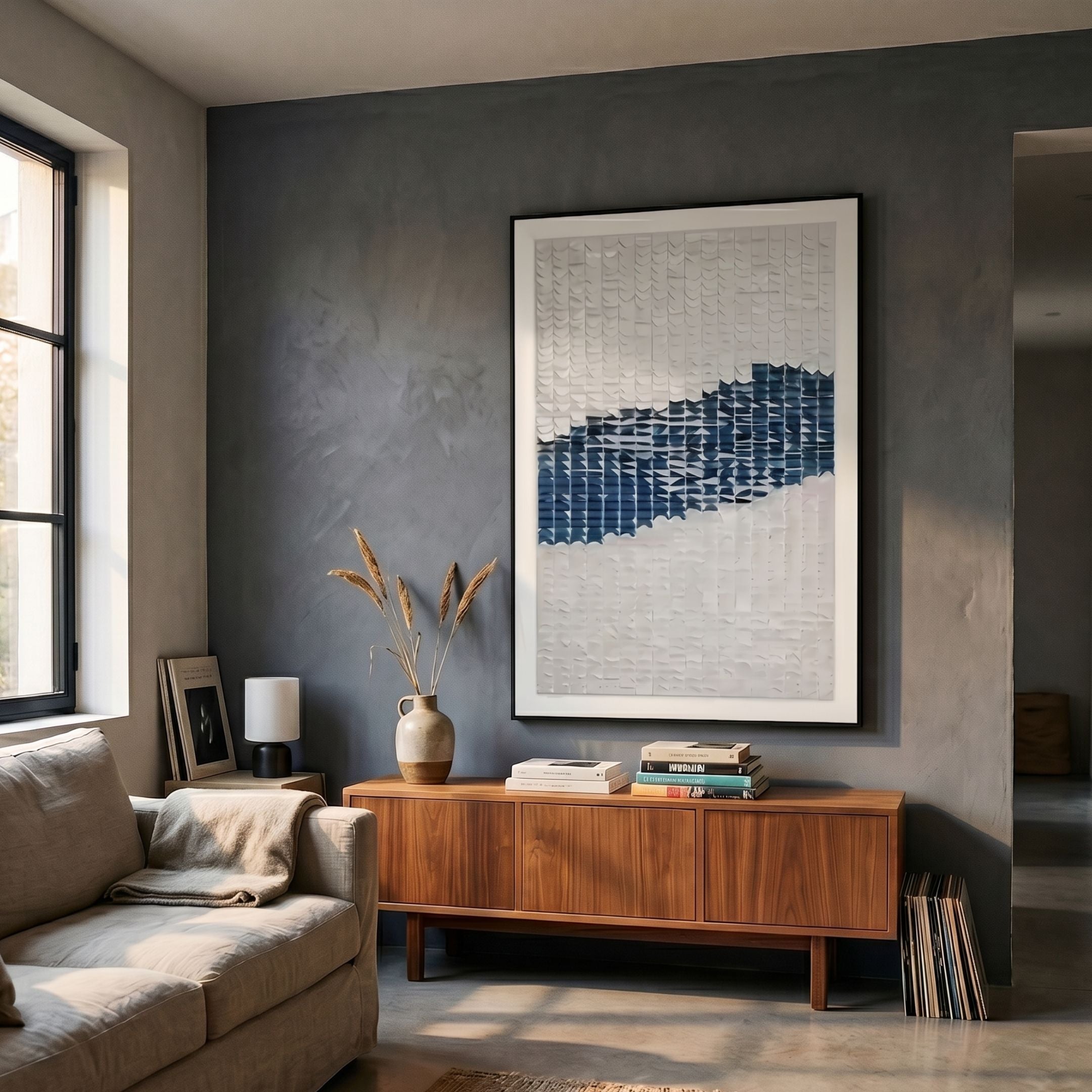 Fractura Deep Indigo Vertical 3D Acrylic Wall Art by Giant Sculptures, framed in black, displayed above a walnut sideboard in a grey-walled living room.