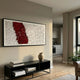 Fractura Crimson Red Wide 3D Acrylic Wall Art by Giant Sculptures displayed above a black console with books and a wooden vase in a modern living room.