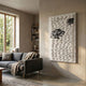 Monovista Frost White & Emerald Green Acrylic Box 3D Paper Wall Art by Giant Sculptures displayed in a neutral living room above a grey sofa beside a window.
