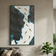 Prosper Black & Blue Metallic Fish 3D Relief Wall Art by Giant Sculptures displayed above a grey sofa, with gold fish on a black and blue abstract panel.