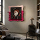 Fabula Girl with Fox Circle Anime Wood Relief 3D Wall Art with pink wavy border displayed on a cream wall above a mushroom lamp in a living room.