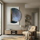 Artevia Blue & White Geometric Wood Relief 3D Wall Art by Giant Sculptures displayed above a wooden console in a neutral living room with armchair and bookshelves.