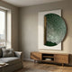 Artevia Green & White Geometric Wood Relief 3D Wall Art mounted above a wooden console in a modern living room with grey sofa and beige walls.