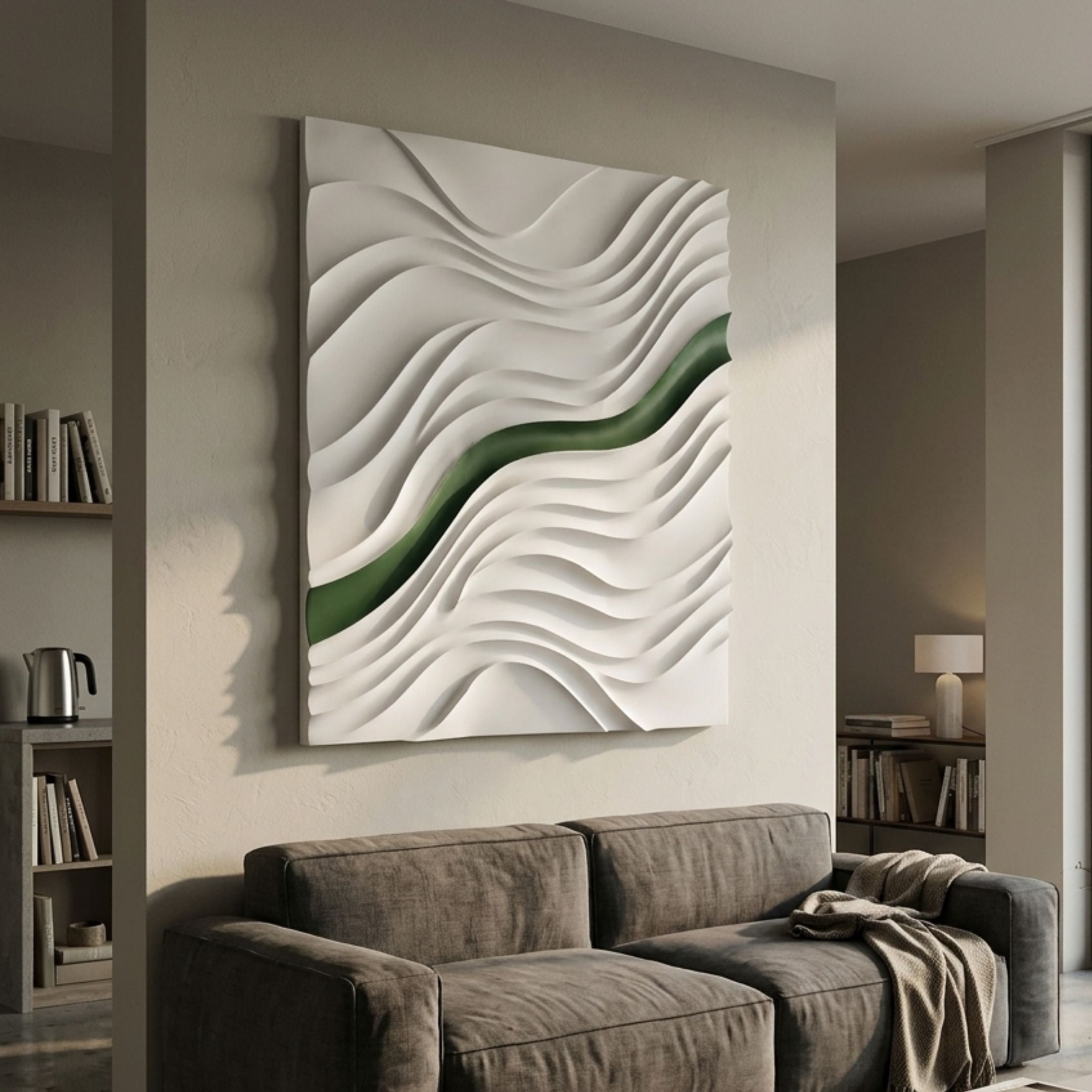 Evolva White & Green Hand-Painted Wood Relief 3D Wall Art by Giant Sculptures, mounted above a grey sofa in a neutral living room with bookshelves.