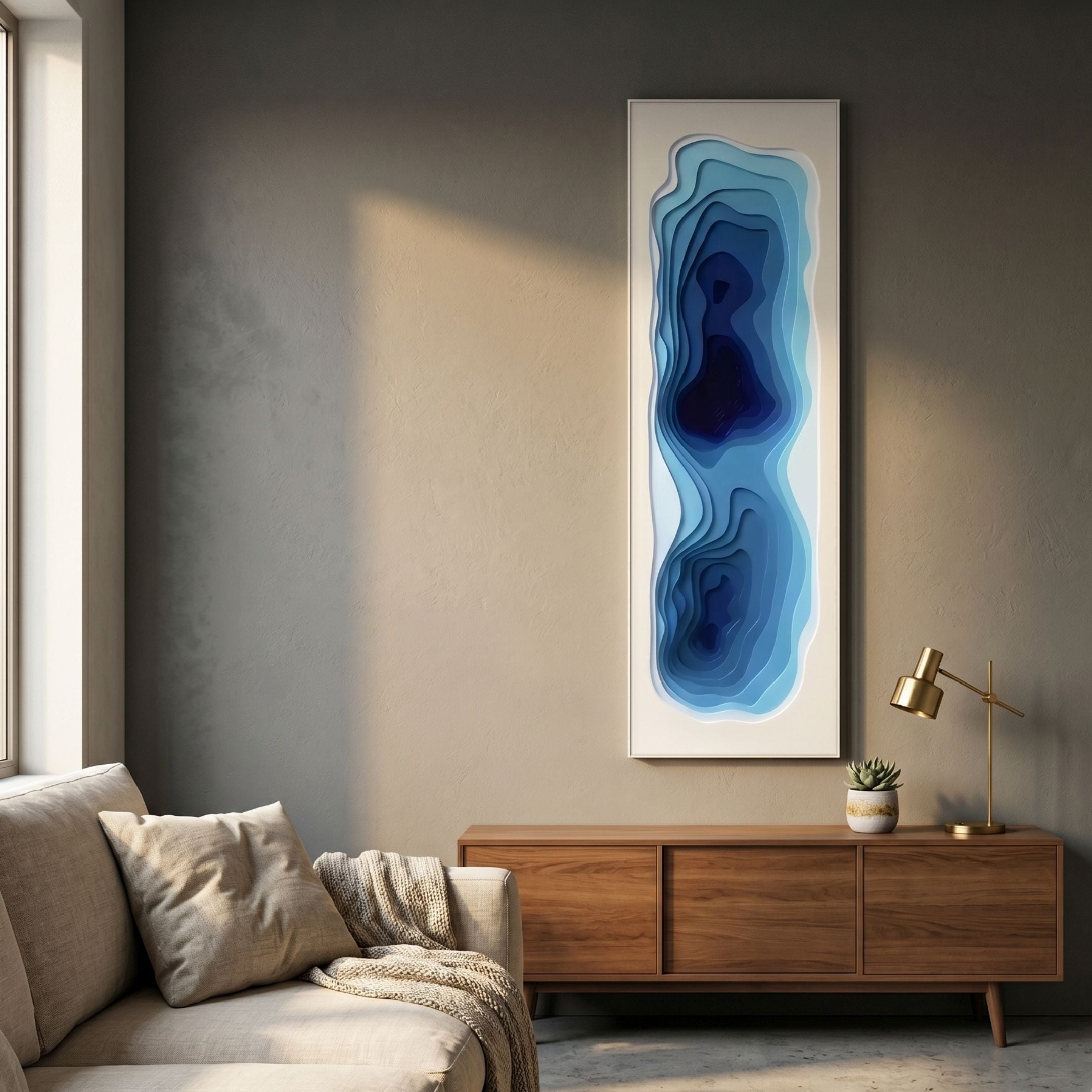 Bathys Blue Gradient Carved 3D Wall Art by Giant Sculptures mounted on a grey wall above a walnut sideboard with brass lamp in a modern living room.