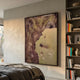 Terravue II Glossy Texture Relief 3D Wall Art by Giant Sculptures in brown and green tones, mounted above a bed beside a tall bookshelf in a bedroom.