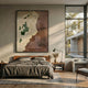 Terravue I Glossy Texture Relief 3D Wall Art by Giant Sculptures displayed above a wooden bed with grey linens in a sunlit modern bedroom with a large window.