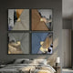 Urbanist 4-Set Split Cityscape Acrylic & Leather 3D Wall Art by Giant Sculptures in grey, brown, gold, and blue, displayed above a bed in a modern bedroom.