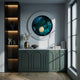 A modern interior featuring a green cabinet, Iriselle Emerald Crystal Porcelain Round 3D Wall Art by Giant Sculptures, decorative vases, books, pampas grass, open shelves with soft lighting, and a large window bringing in natural light.