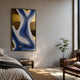 Marea Organic Flow Blue & Gold Wood Relief 3D Wall Art by Giant Sculptures displayed in a sunlit bedroom above a wooden nightstand beside a potted plant.