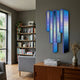 Opaline Twilight Azure Gradient Wood Relief 3D Wall Art by Giant Sculptures, blue-to-purple rounded columns mounted above a teak sideboard in a modern living room.