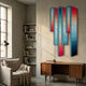 Opaline Coral Teal Gradient Wood Relief 3D Wall Art by Giant Sculptures displayed above a mid-century wooden sideboard in a sunlit reading nook.