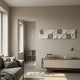 Averra White & Sage Linear Wood Relief 3D Wall Art by Giant Sculptures mounted horizontally in a minimalist living room above a wood and white sideboard.