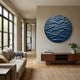Orenda Ripple Wave Blue Wood Relief 3D Wall Art by Giant Sculptures mounted above a walnut console in a minimalist living room with linen sofa and tall windows.