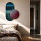 Embera Abstract Circle Navy Warm Gradient 3D Wall Art by Giant Sculptures, ribbed navy-green oval overlapped by a red-purple sphere-studded disc above a bed.