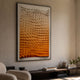Elorium Orange Gradient Hand-Painted Wood Relief 3D Wall Art by Giant Sculptures framed above a dark wood console with books in a warm living room.