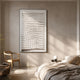 Elorium White Weave Hand-Painted Wood Relief 3D Wall Art by Giant Sculptures displayed in a neutral bedroom above a wooden chair, beside a linen-dressed bed.