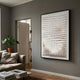 Elorium White Diamond Hand-Painted Wood Relief 3D Wall Art by Giant Sculptures in a black frame, displayed on a grey living room wall above a linen sofa.