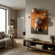 Rose Gold 3D Astronaut Bunny Balloon Lighthouse Wall Art by Giant Sculptures displayed above a walnut console in a neutral living room with sofa and plant.