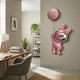 Pink Astronaut Bunny Balloon 3D Wall Art by Giant Sculptures, 58cm bunny in pink spacesuit with silver visor holding a pink moon balloon, mounted in a home office.