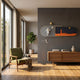 3D Space Astronaut & Lighthouse Dual-Panel Wall Art by Giant Sculptures mounted on a grey wall above a walnut sideboard in a modern living room with a green armchair.