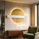 Aeon Golden Sand Leather 3D LED Wall Art by Giant Sculptures with mustard circle, white bar, and linework rectangle, glowing above a walnut sideboard and green armchair.
