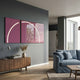 Enigma Rosewood Glow LED Wall Art by Giant Sculptures, two mauve panels with a white neon arc, mounted on a grey wall above a walnut sideboard beside a blue sofa.