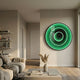 Reflex Emerald Mirror 3D LED Wall Art by Giant Sculptures glowing green on a beige living room wall above a coffee table and beige sofa.