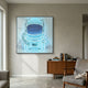 Stellar Neon Aqua Acrylic 3D LED Wall Art by Giant Sculptures showing an aqua-blue astronaut helmet with starry visor, mounted above a wooden sideboard.