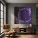Helios Amethyst Crystal Porcelain LED Wall Art by Giant Sculptures, a three-panel purple triptych with a white neon arc, displayed above a walnut sideboard beside a tan leather lounge chair.