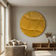 Orbura Yellow Circular 3D Wood Relief Wall Art by Giant Sculptures mounted above a wooden console and beige sofa in a neutral modern living room.