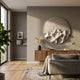 Solivis Sand Round 3D Wood Relief Wall Art by Giant Sculptures, sand-beige cratered lunar surface, displayed above a walnut sideboard in a modern living room.