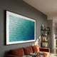 Elytrum Blue Gradient Hand-Painted Wood Relief 3D Wall Art by Giant Sculptures, framed above a rust velvet sofa in a modern grey living room with shelving.