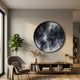 Terranova Shadow Black Round Wood Carving 3D Wall Art by Giant Sculptures displayed above a wooden console in a neutral living room with armchair and fiddle leaf fig.